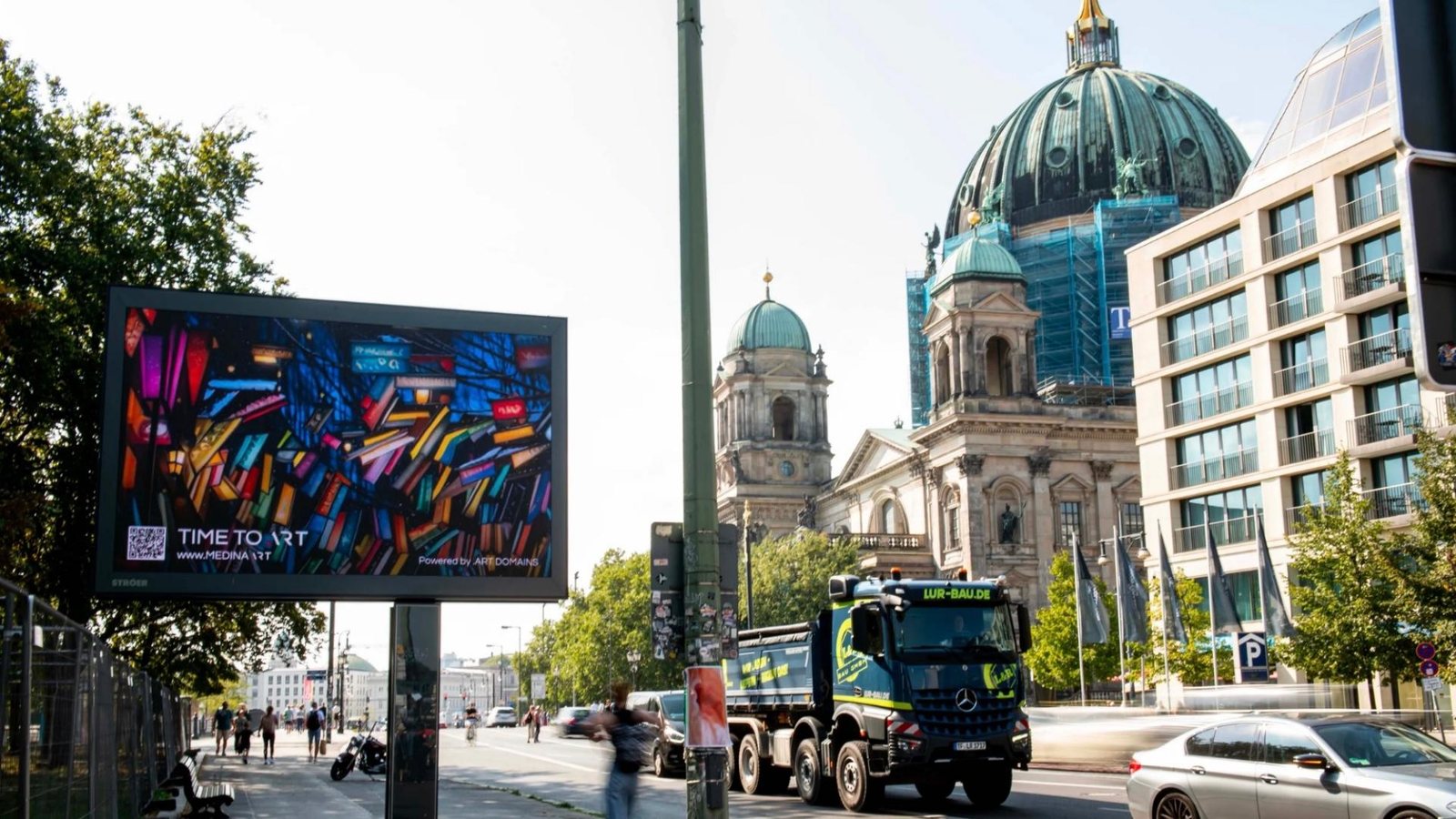 .art on a billboard beside the Berlin Cathedral