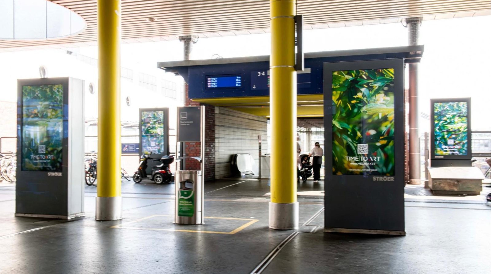 .art screens across a Berlin station